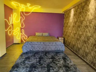 Cama o camas de una habitación en Hermoso departamento con jacuzzi