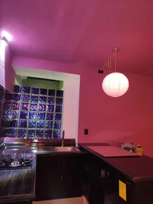 Una cocina o zona de cocina en Hermoso departamento con jacuzzi