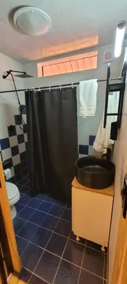 Un baño de Cabañas Vive el Bosque