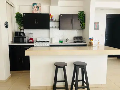 Una cocina o zona de cocina en Depa con alberca a 2 minutos Playa Vicente Fox 1