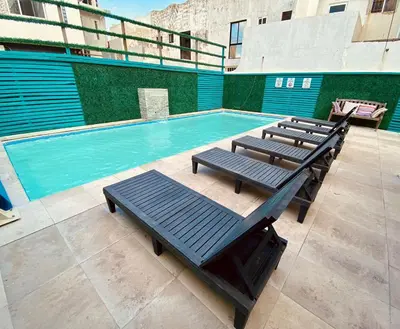 Piscina en o cerca de Depa con alberca a 2 minutos Playa Vicente Fox 1