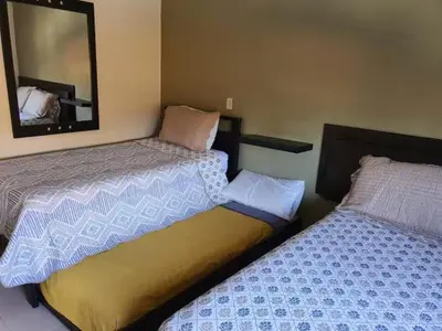 Cama o camas de una habitación en Casa Tulipanes