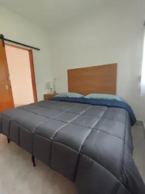 Cama o camas de una habitación en Bungalow Lomas de Cocoyoc