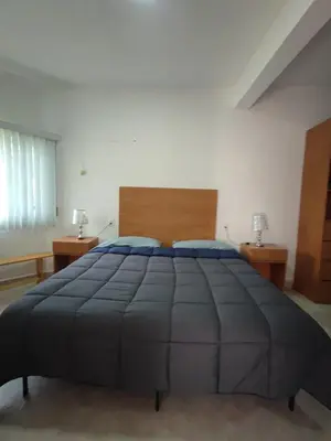 Cama o camas de una habitación en Bungalow Lomas de Cocoyoc
