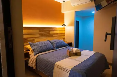 Cama o camas de una habitación en Hotel Casa Tsumbak
