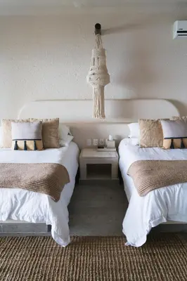 Cama o camas de una habitación en Villa Allegro, Las Brisas Acapulco