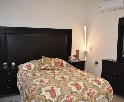 Cama o camas de una habitación en Casa Palmera