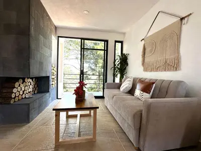 Zona de estar de Casa Madera 2B
