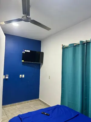 Una televisión o centro de entretenimiento en Departamento San José