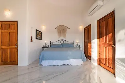 Cama o camas de una habitación en 1042 - Villa Tres Hermanas