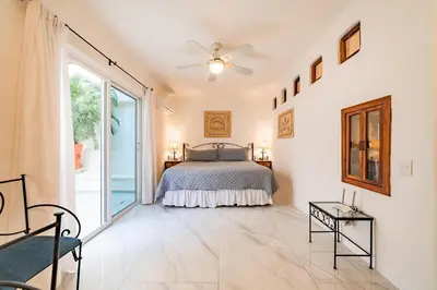Cama o camas de una habitación en 1042 - Villa Tres Hermanas