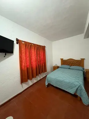 Cama o camas de una habitación en casa los sabinos