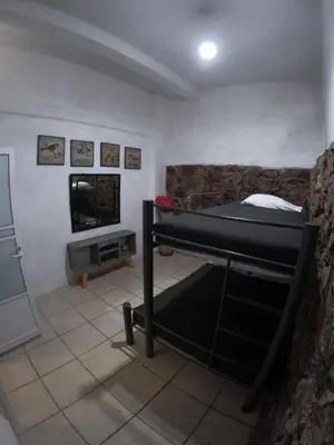 Cama o camas de una habitación en Casa León