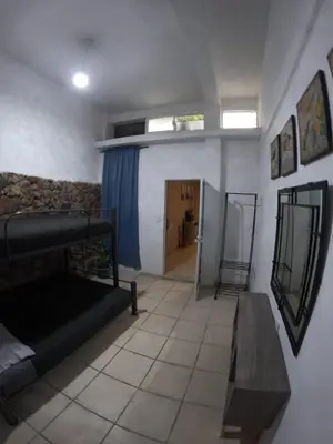 Una televisión o centro de entretenimiento en Casa León