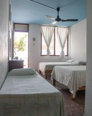 Cama o camas de una habitación en Hotel Walton