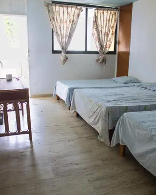 Cama o camas de una habitación en Hotel Walton