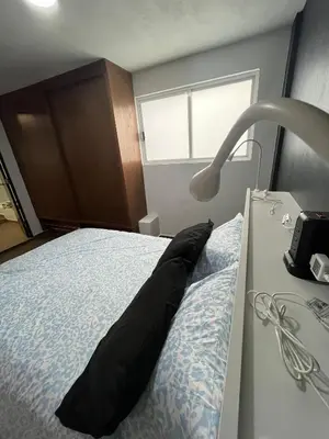 Cama o camas de una habitación en Departamento Rompecabezas SúperAnfitrión Coyoacan