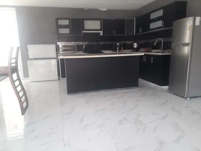 Una cocina o zona de cocina en Hermosa Quinta Arcangeles