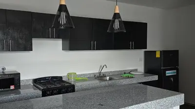 Una cocina o zona de cocina en La Casa del Sol