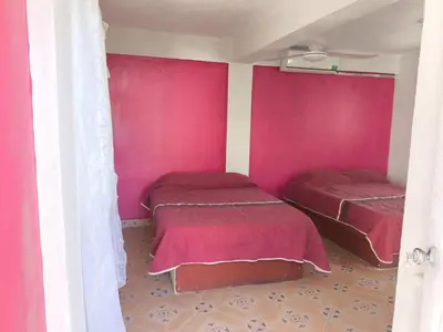 Cama o camas de una habitación en HOSTEL Las Colinas