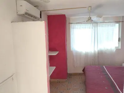 Cama o camas de una habitación en HOSTEL Las Colinas