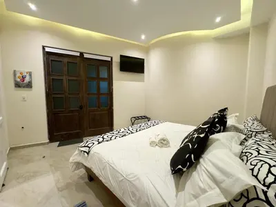 Una televisión o centro de entretenimiento en Loft Santorino 3 en Valquirico