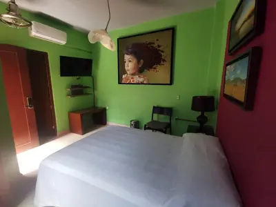 Cama o camas de una habitación en Hotel Arcadia