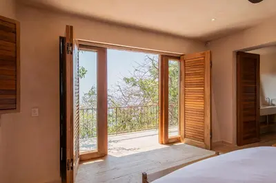 Cama o camas de una habitación en La Valise Mazunte, Member of Small Luxury Hotels
