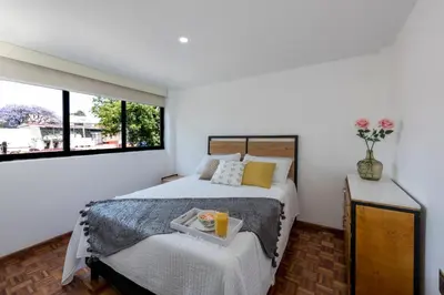 Cama o camas de una habitación en Departamento en Coyoacán 7