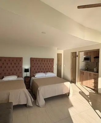 Cama o camas de una habitación en Suite Torres Gemelas Acapulco