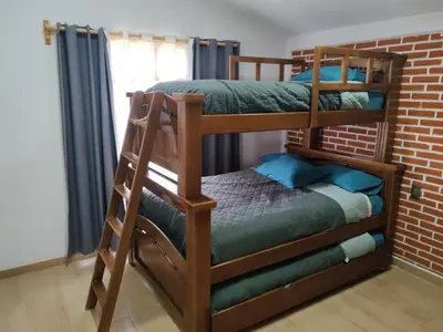 Cama o camas de una habitación en Cabaña Rebeca