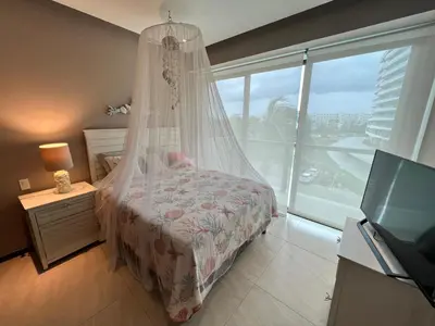 Cama o camas de una habitación en Acapulco Diamante La Isla Residences & Spa