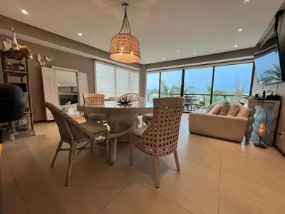 Una televisión o centro de entretenimiento en Acapulco Diamante La Isla Residences & Spa