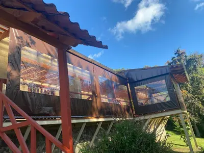 Un balcón o terraza de Anxelli Hermosa Cabaña en Bosque de Niebla