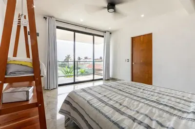 Cama o camas de una habitación en Hermosa casa de playa