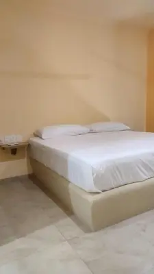 Cama o camas de una habitación en Hotel tortuga real Huatulco