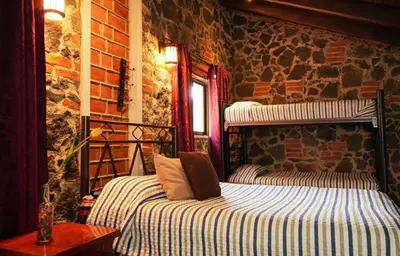 Cama o camas de una habitación en Cabañas Calpulalpan de paso