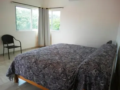 Cama o camas de una habitación en Los Amates