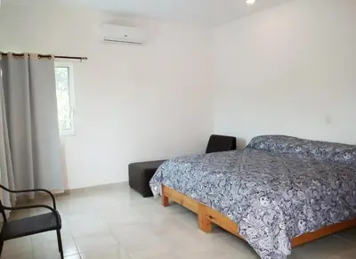 Cama o camas de una habitación en Los Amates