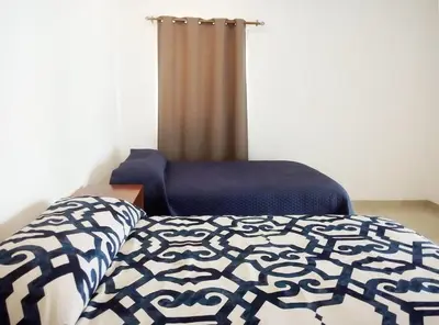 Cama o camas de una habitación en Los Amates