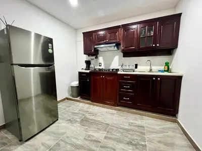 Una cocina o zona de cocina en Departamentos Huitzilin