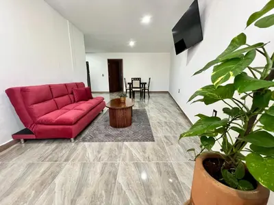 Una televisión o centro de entretenimiento en Departamentos Huitzilin