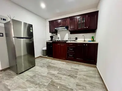 Una cocina o zona de cocina en Departamentos Huitzilin