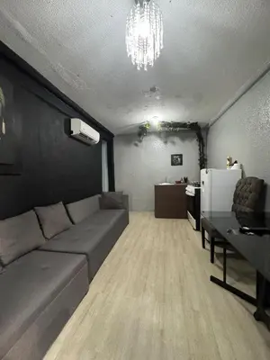Zona de estar de Habitación cómoda para su estancia