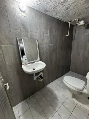 Un baño de Habitación cómoda para su estancia