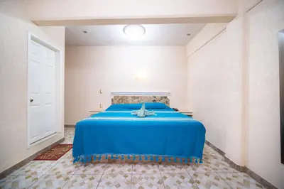 Cama o camas de una habitación en HOTEL PENÍNSULA Salina Cruz