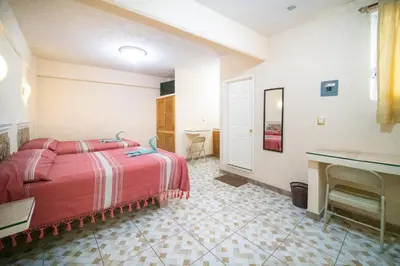 Cama o camas de una habitación en HOTEL PENÍNSULA Salina Cruz