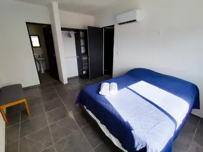 Cama o camas de una habitación en Fraccionamiento Puerta al Sol Acapulco