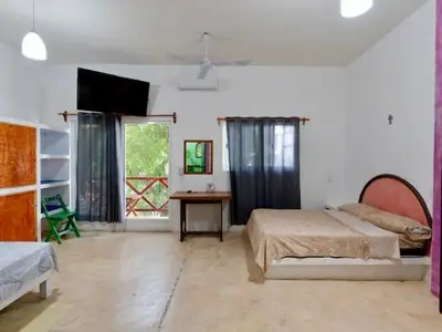Cama o camas de una habitación en Bonita casa cerca de la playa