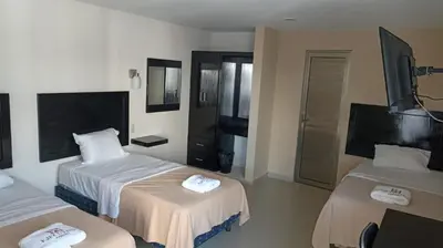 Cama o camas de una habitación en Hotel Ejecutivo Express Paraiso